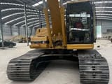 Caterpillar 320BL crawler excavator, rear view