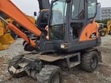 2018 Doosan DX60W wheel excavator, front three-quarter view