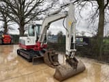 2015 Takeuchi TB250 mini excavator, side profile view
