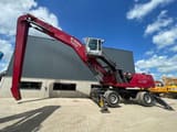 2011 Fuchs MHL380 material handler, side view