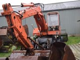 1973 Atlas 1602 wheel excavator, front three-quarter view