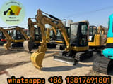 2023 Caterpillar 303CCR mini excavator, front three-quarter view