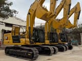 2024 Caterpillar 336 crawler excavator, side view of multiple units