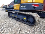 XCMG XE55E mini excavator side view of tracks and undercarriage
