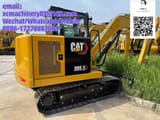 2026 Caterpillar 305.5 mini excavator, rear three-quarter view