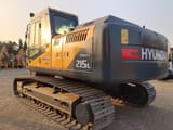 2025 Hyundai R215L crawler excavator, rear three-quarter view