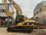 2012 Caterpillar 320CL excavator side view