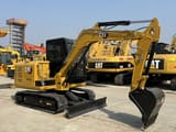 2023 Caterpillar 305.5E mini excavator, side view