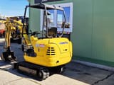 2002 Komatsu PC12R-8 mini excavator, rear three-quarter view