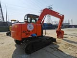 2019 Hitachi Zaxis 70 mini excavator, rear three-quarter view
