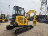 2022 Komatsu PC-55MR mini excavator, rear three-quarter view