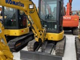 2020 Komatsu PC30MR-3 mini excavator, front three-quarter view
