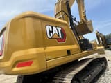 2022 Caterpillar 330GC crawler excavator rear three-quarter view