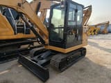 2026 Caterpillar 305.5E2 mini excavator, front three-quarter view