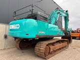 2018 Kobelco SK500LC-10 crawler excavator, rear three-quarter view
