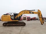 2014 Caterpillar 329E crawler excavator, side view