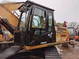 2018 Caterpillar 312D crawler excavator cab and side view