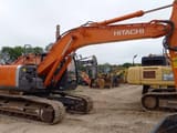 2012 Hitachi Zaxis 210LC crawler excavator, side view