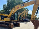 2023 Caterpillar 320GC crawler excavator, side view