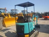 2023 Komatsu PC18 mini excavator, rear three-quarter view