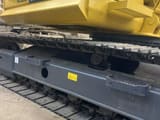 2019 Komatsu PC130 crawler excavator side view of undercarriage