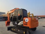 2023 Hitachi ZX70 mini excavator, rear three-quarter view