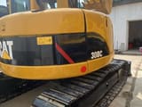 2021 Caterpillar 308C mini excavator rear three-quarter view