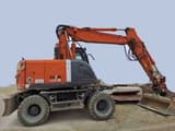 2011 Hitachi Zaxis 145W wheel excavator, side view
