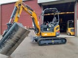 XCMG XE27E mini excavator, side view