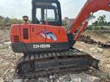 Doosan DH55 crawler excavator side view