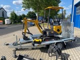 Berger Kraus BK1000JS mini excavator on a trailer, side view