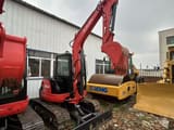 2023 Kubota U55-4 mini excavator, rear three-quarter view