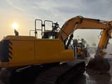 2019 JCB JS220XL excavator, rear three-quarter view