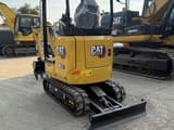 2022 Caterpillar 301.7 mini excavator, rear three-quarter view