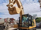 2022 Caterpillar 320GC crawler excavator, front three-quarter view