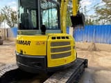 2025 Yanmar VIO55 mini excavator, rear three-quarter view