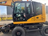 2016 Caterpillar 315 UNAC 22 TTR wheel excavator side view