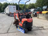 2015 Kubota 008-3 mini excavator, rear three-quarter view