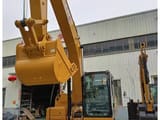 2025 Caterpillar 320GX crawler excavator front view