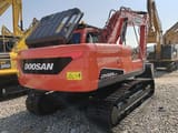 2024 Doosan DX225LCA crawler excavator, rear three-quarter view