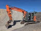 2010 Hitachi ZX135US-3 crawler excavator, side view