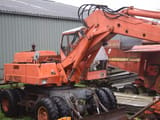 1973 Atlas 1602 wheel excavator, rear three-quarter view