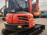 Kubota KX165 mini excavator, rear three-quarter view