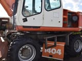 2001 Atlas 1404 M wheel excavator side view