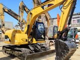 2011 Caterpillar 312C crawler excavator, side view