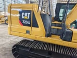 2023 Caterpillar 320GC crawler excavator side view