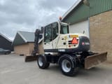 2015 Terex TW85 wheel excavator, rear three-quarter view