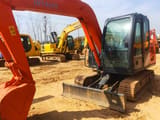 Hitachi ZX60 mini excavator, front three-quarter view