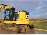 2019 Caterpillar 325F CR crawler excavator, rear three-quarter view
