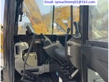 2023 Caterpillar 305.5E2 mini excavator interior view